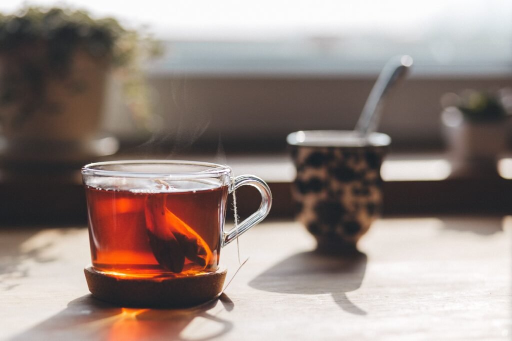 Choosing herbal tea in the evening to support better sleep.