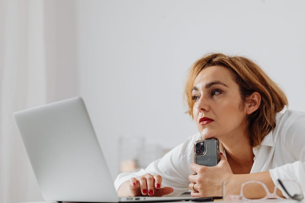 Woman managing multiple responsibilities and experiencing chronic stress.