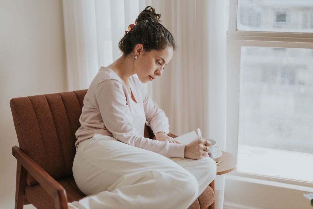 Woman planning healthy lifestyle changes and overcoming procrastination.