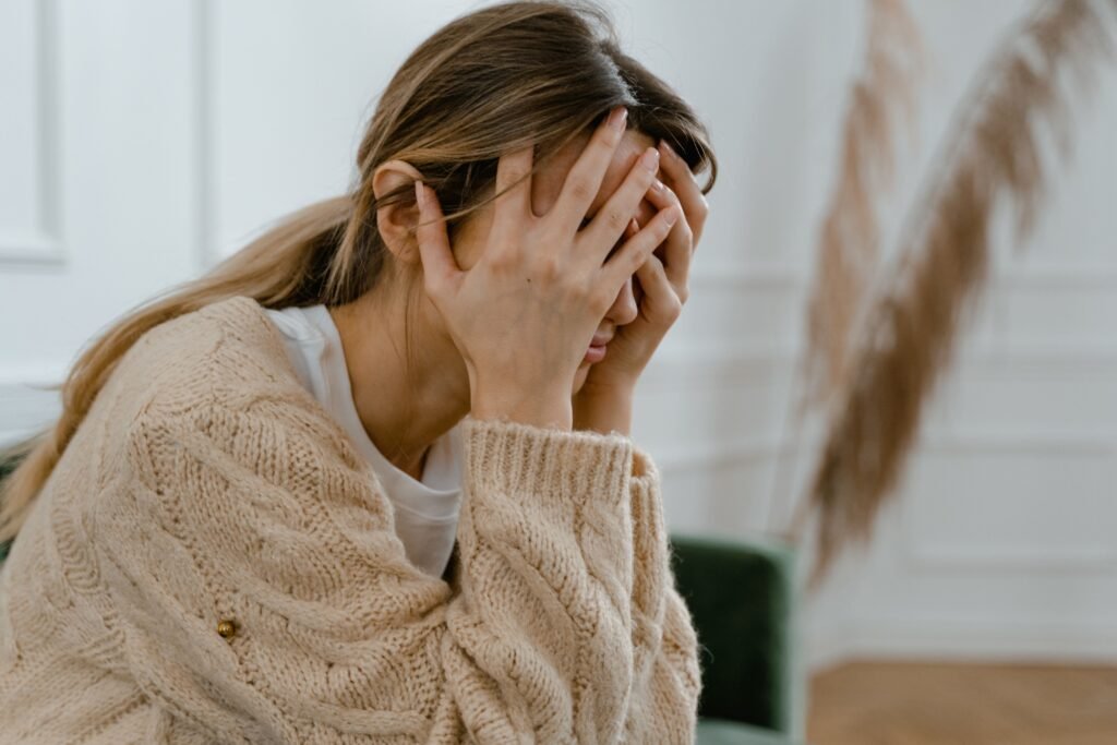 Person feeling discouraged after falling off track with health goals.