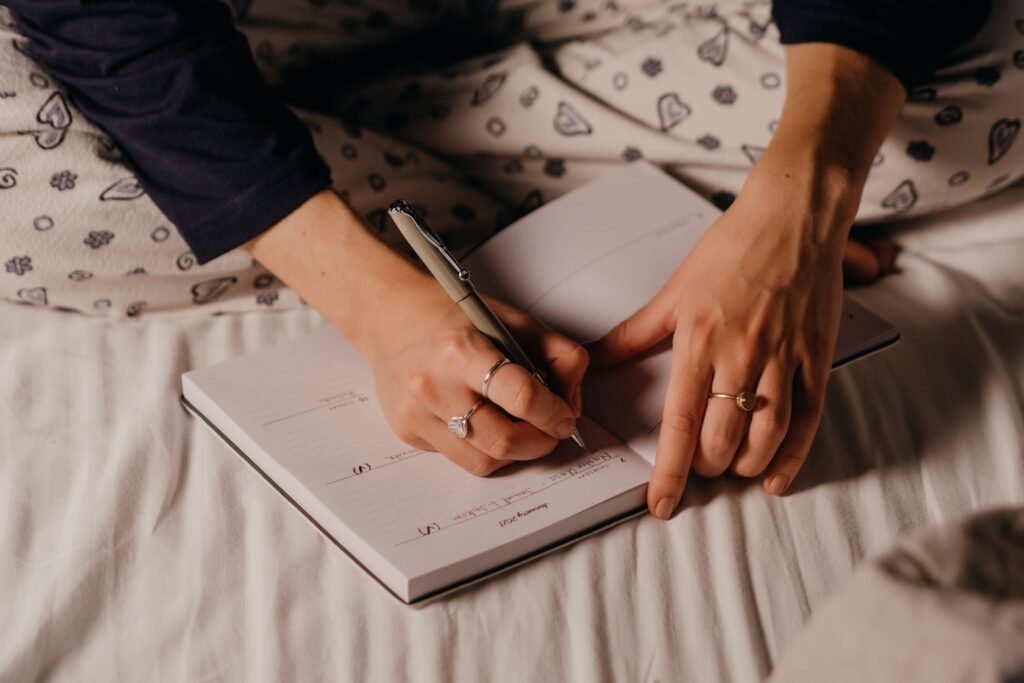 Woman tracking healthy habits and celebrating consistent progress.
