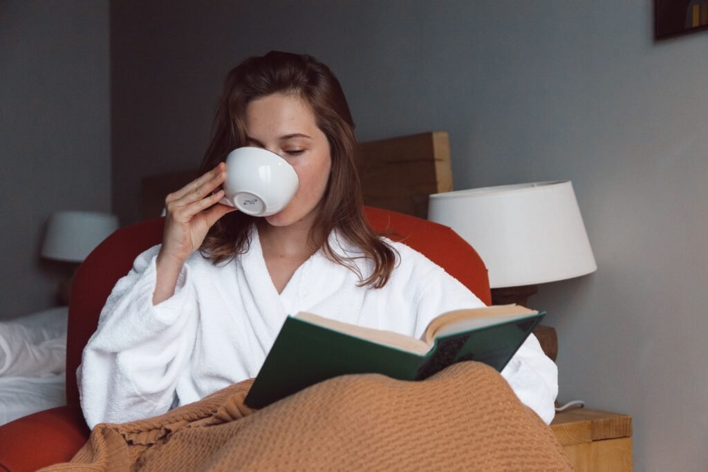 Woman prioritising sleep and creating a relaxing bedtime routine.