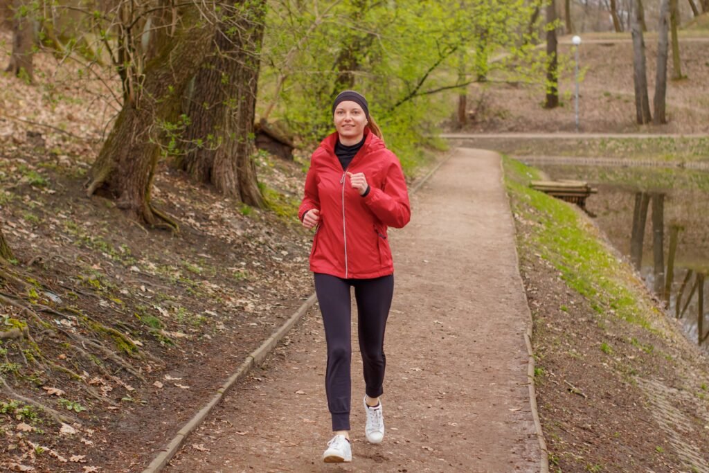 Healthy woman feeling energised after adopting sustainable wellness habits.