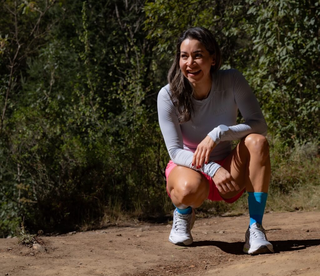 Woman celebrating small healthy habits and daily progress.